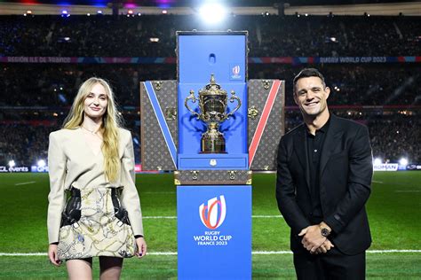 Sophie Turner and Dan Carter Dazzle in Louis Vuitton at Rugby 